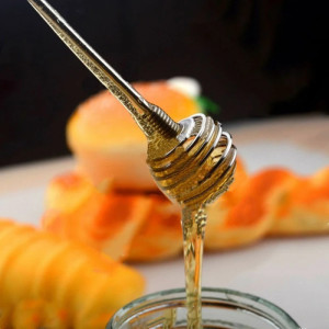 Utilisation de la Touillette à miel en acier