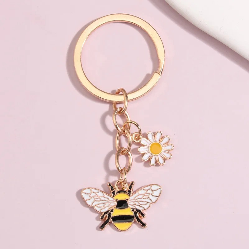 Schlüsselanhänger Biene mit Funkelnder Blüte – Eleganz & Natur