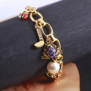 Bracelet Grenouille avec multiples breloques