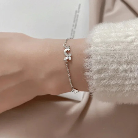 détails Bracelet Papillon Élégance Florale