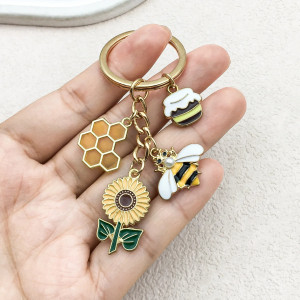 Schlüsselanhänger Goldene Biene & Sonnenblume – Eleganz & Natur