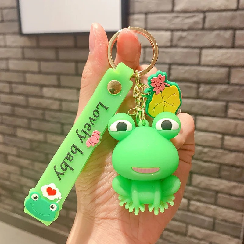 Süßer Frosch Schlüsselanhänger "Fröhliches Leuchten" aus Silikon