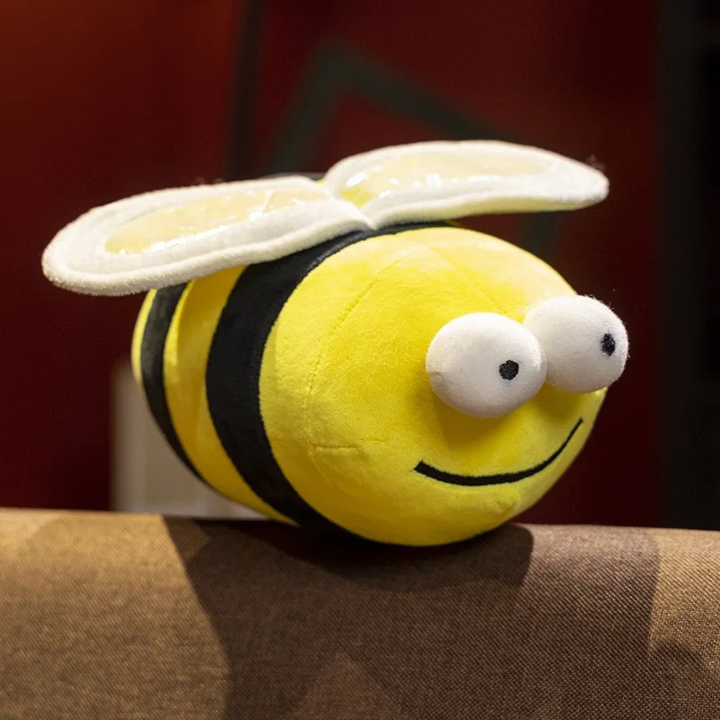 Peluche abeille blanche très douce avec un petit sourire adorable