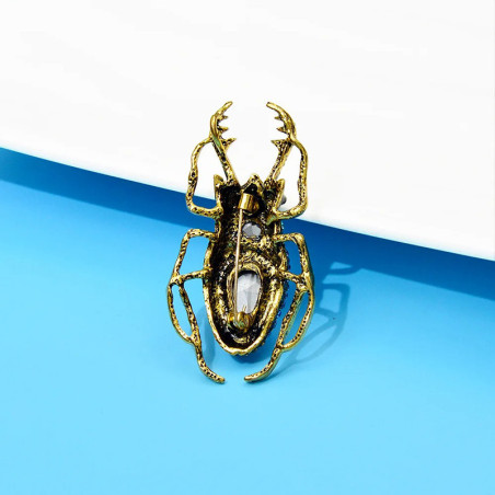 Skarabäus Brosche "Königssaphir" – Eleganter blauer Schmuck
