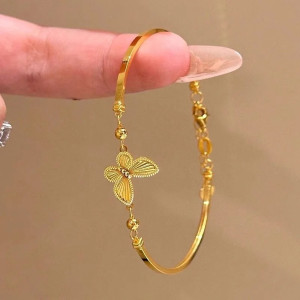 Verstellbares Schmetterlingsarmband „Goldener Glanz“