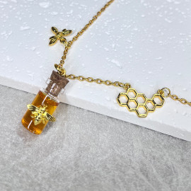 détails Collier pendentif pot de miel et breloques
