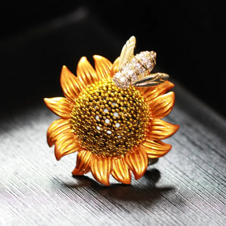 Broche tournesol flamboyant et abeille dorée