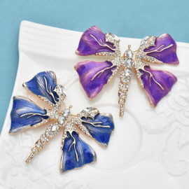 Broche Papillon aux ailes stylées