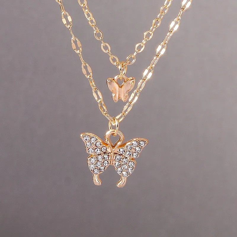 Collier papillon en cristal plaqué or