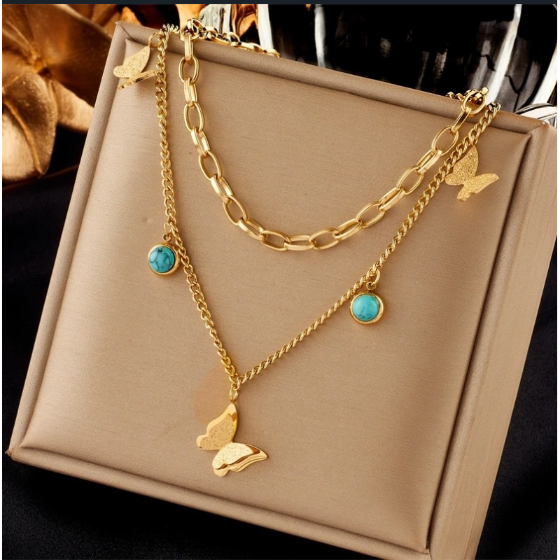 Collier papillon double châine avec  papillon scintillant et pierres turquoise