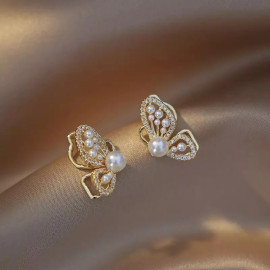 Boucles d'oreilles papillon en or avec perle