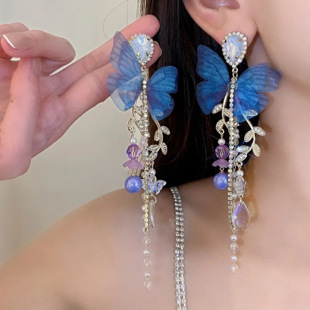 Boucles d'oreilles papillon bleu et pendant de cristaux