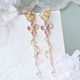 Boucles d'oreilles papillon avec grand papillons doré fleurs roses et longs pendants à cristaux