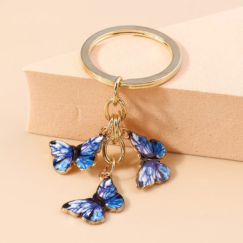 Porte-clés papillon à motif marbré