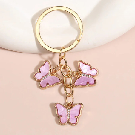 Porte-clés papillon en résine et strass - couleur rose