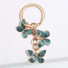 Porte-clés papillon en émail plaqué or - couleur bleu