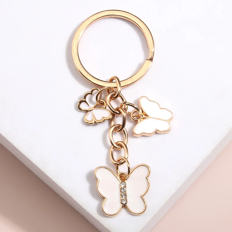 Porte-clés papillon en émail brillant - couleur blanc
