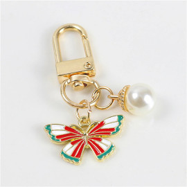 Porte-clés papillon aux couleurs vives avec perle Blanche - modèle 1